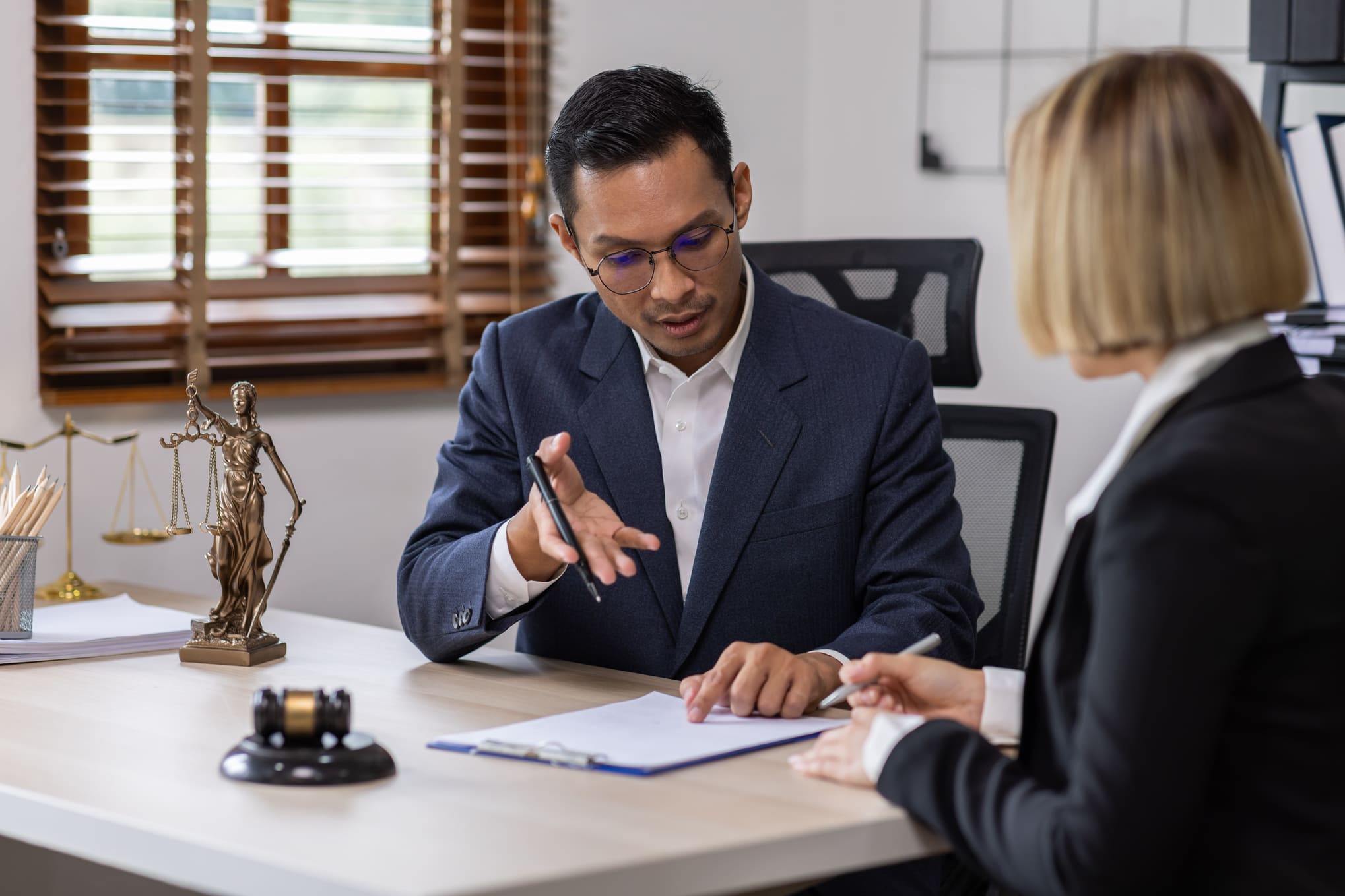rideshare accident attorney meeting with client