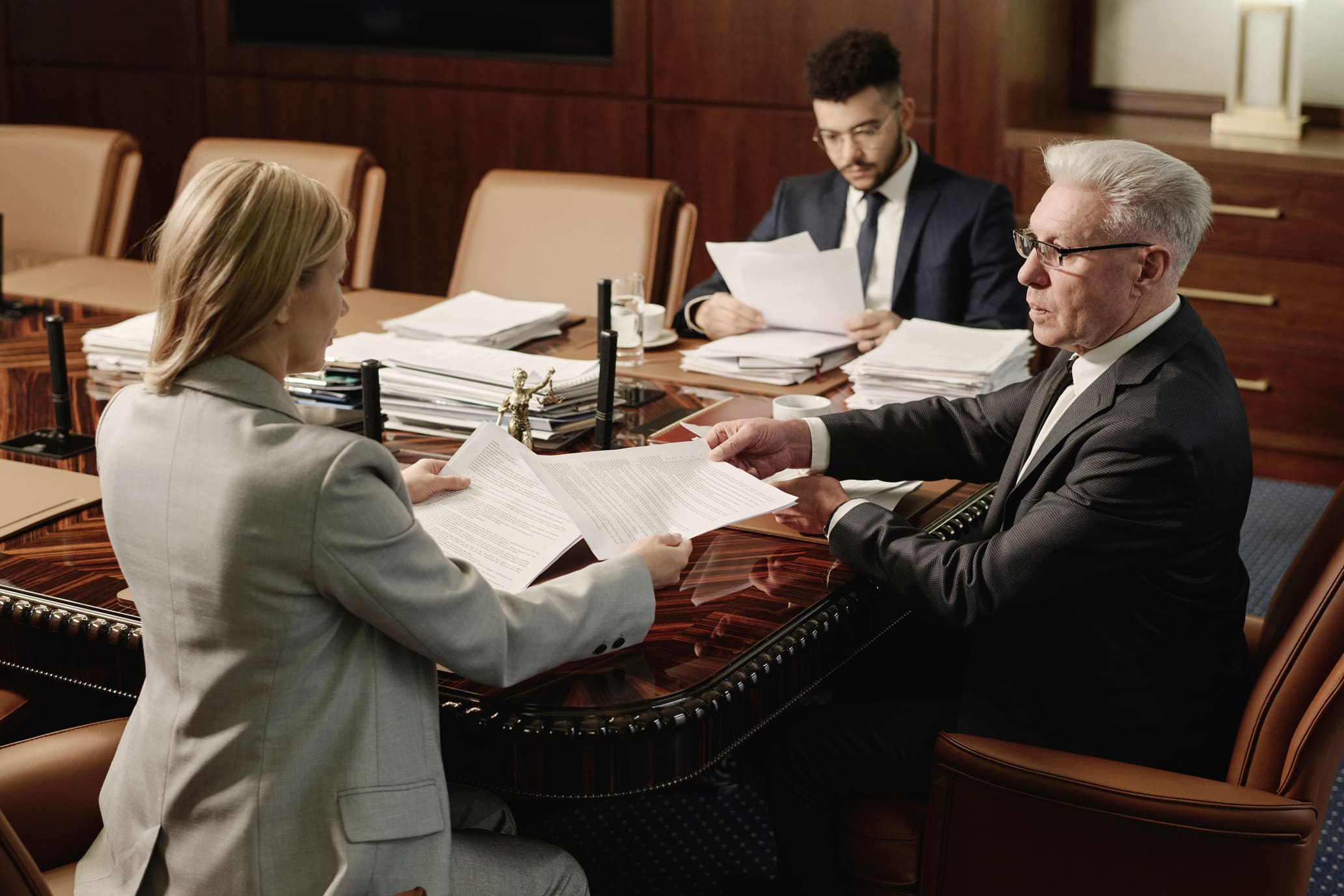 lawyers discussing personal injury settlement