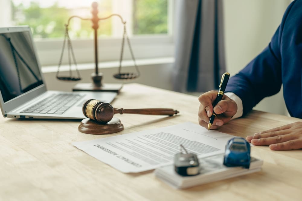 car accident injury lawyer working on a case