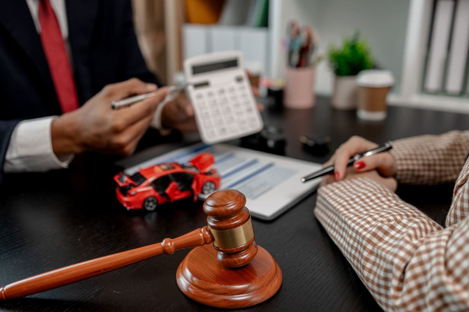 lawyer explaining car accident concussion settlement to client