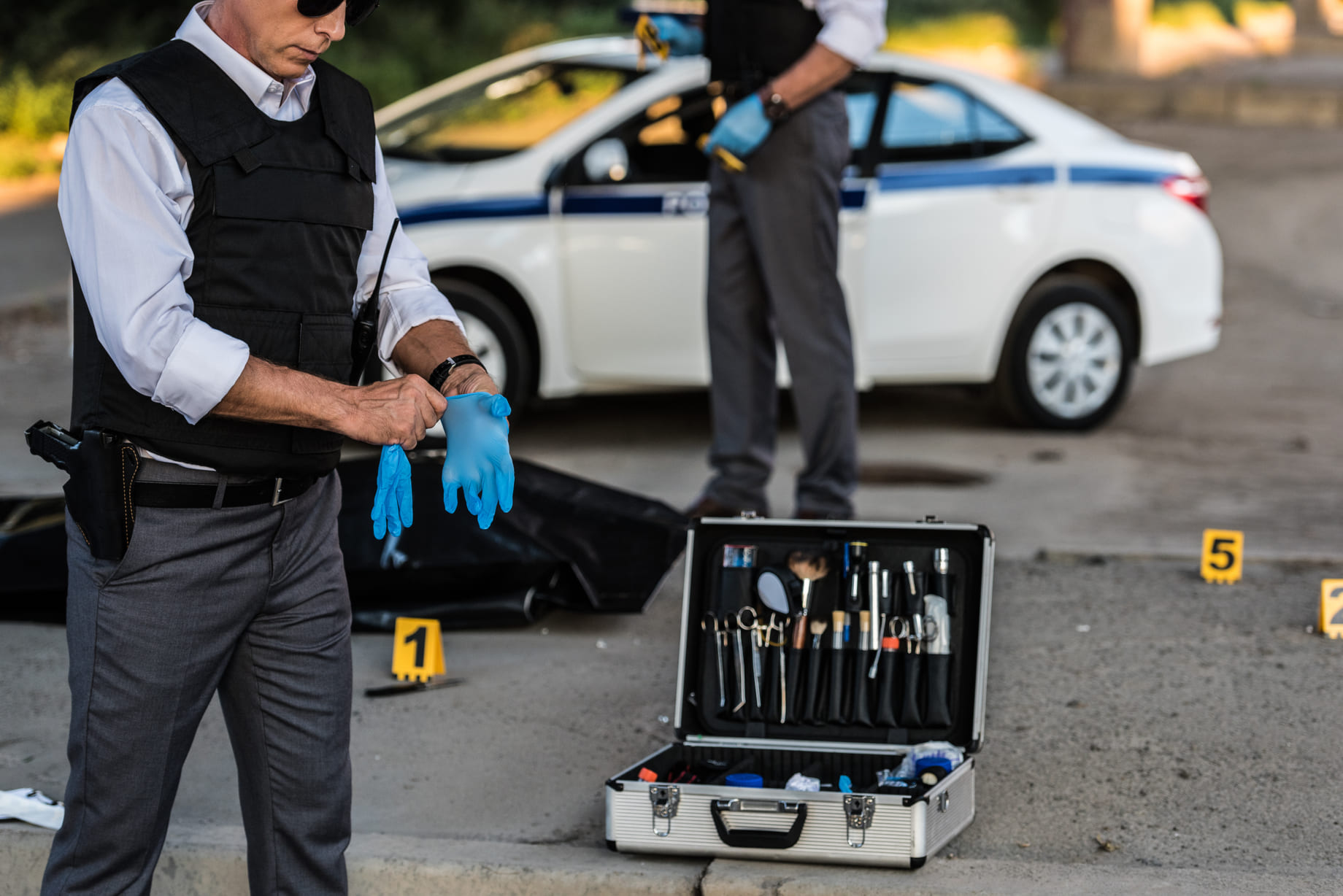 police collecting car accident evidence