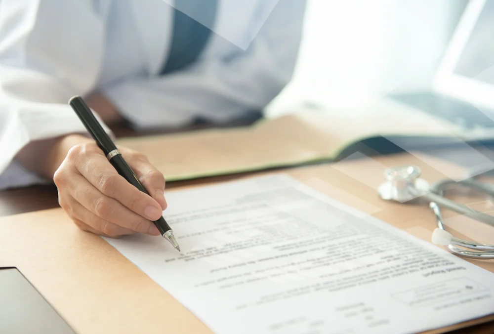 doctor going over a diagnostic report with a patient